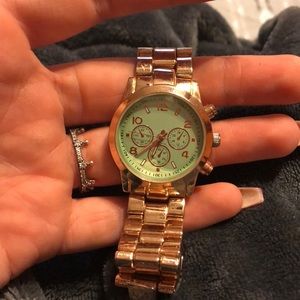 Rose gold and turquoise watch